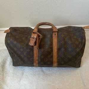 Louis Vuitton keepal travel bag 100% Authentic